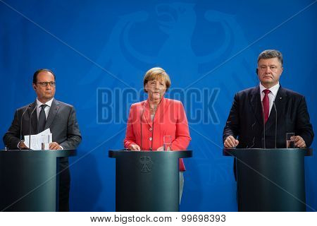 Francois Hollande, Angela Merkel And Petro Poroshenko