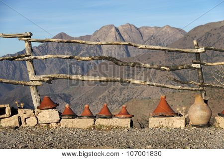 Moroccan tajines for sale in Atlas Mountains - traditional way of cooking Moroccan dishes