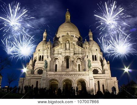 The Sacre Coeur church with fireworks, celebration of the New Year in Paris, France