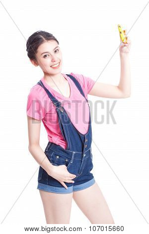Beautiful smiling young woman taking selfies with her smart phone