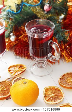 mulled wine with decorated christmas tree