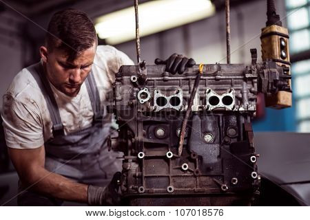 Engineer Fixing Engine