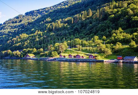 Meadows And Village On Hardanger Fiord.