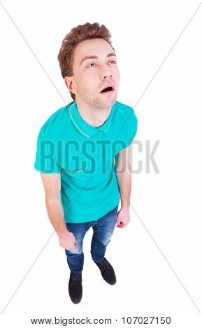 Top view of a bored man. tired man looking up. Isolated over white background. Bored guy. wide-angle lens.