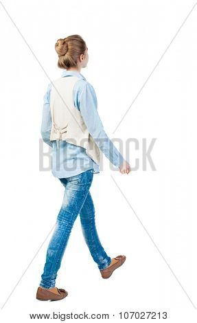 back view of walking  woman. beautiful girl in motion.  backside view of person.  Rear view people collection. Isolated over white background. Girl in a vest pass us by....