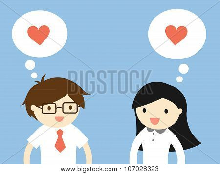 Business concept, Love in office. Businessman and business woman feeling love each other.