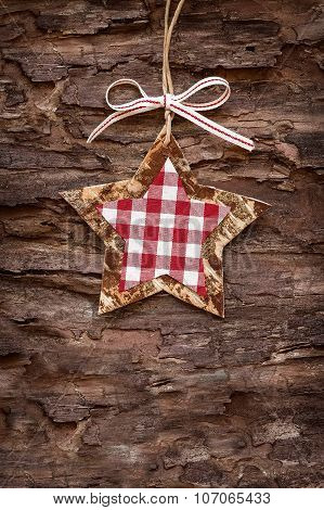 christmas decoratons with baubles on wooden background