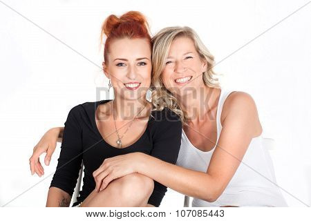 mother and daughter relationships. family. two beautiful women sitting together. generation, joy, ti