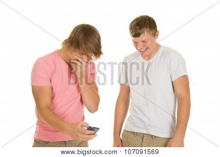 Two Boys Laughing Looking At Phone