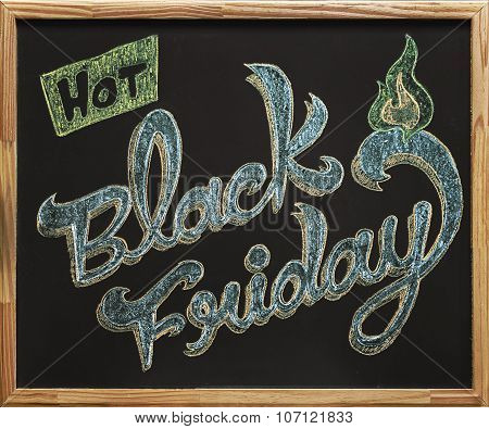 Black Friday calligraphy over blackboard