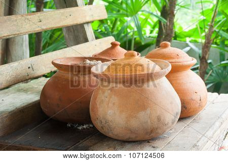 Clay Pots Or Porttery On A Shelf  Outside Kitchen Room