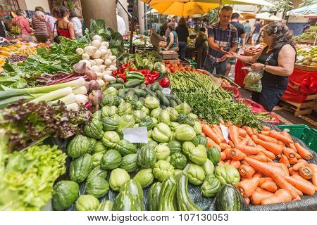 FUNCHAL, MADEIRA, PORTUGAL - JUNE 29, 2015: Bustling fruit and vegetable market in Funchal Madeira on June 29, 2015.