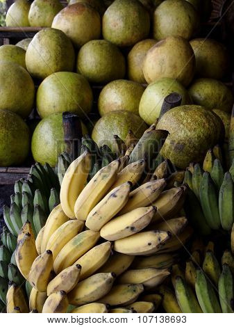 Fresh bananas and pomelo fruits
