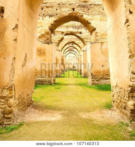 Old Moroccan Granary In The Green Grass And Archway  Wall