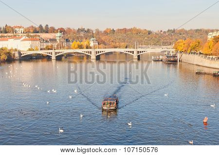 Autumn View Of Vltava River And Manesuv Bridge In Prague