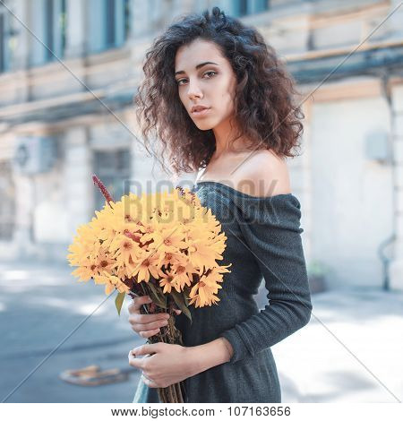 Fashion style photo of a young woman
