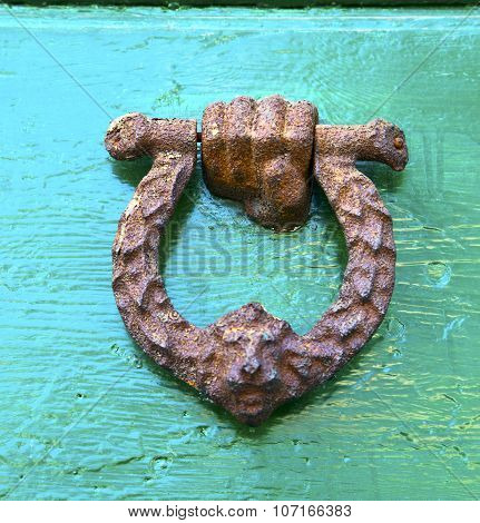 Abstract    Knocker In A   Closed Wood Door Olgiate  Varese Italy