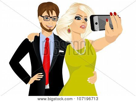happy couple taking a selfie using her smartphone