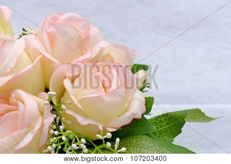 Pink Artificia Flower On White Cloth Background