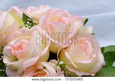 Pink Artificia Flower On White Cloth Background
