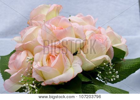 Pink Artificia Flower On White Cloth Background