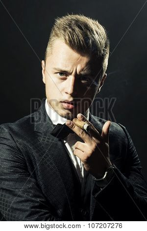 Portrait Of Handsome Man With Havana