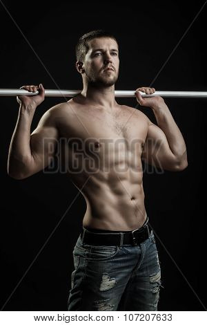 Muscular Man With Crossbar