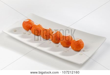 Delicious Motichur ladu- an Indian sweet presented in contemporary fashion.