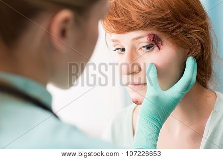 Doctor Medicating Eye Wound