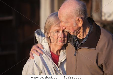 Man Comforting Sad Woman