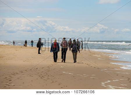 People On Sandy Beach Near North Sea In Zandvoort, The Netherlands
