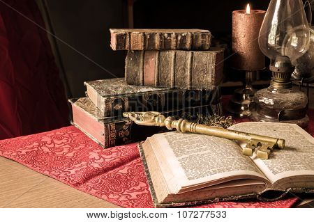 Artistic Vintage Big Key With Old Books