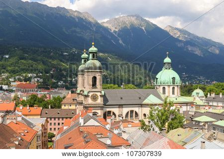 INNSBRUCH, AUSTRIA - JULY 2015 : Bird view of roofs and buildings in Innsbruck city, Austria on July 11, 2015. Photo taken from City Tower (Stadtturn). 