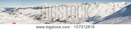 View Of A Snowy Mountain Valley