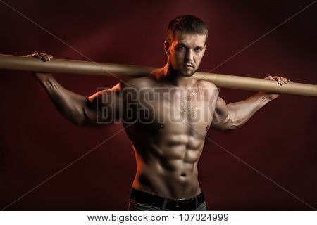 Muscular Man With Crossbar