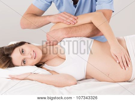 Pregnant Woman At The Physiotherapist