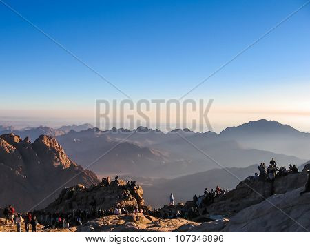 Pilgrims on Mount Sinai at sunrise