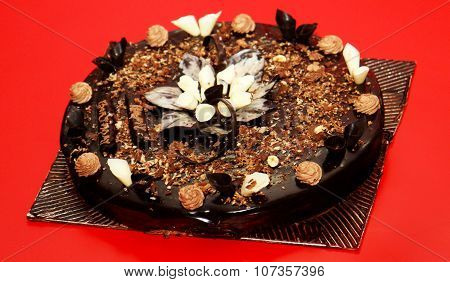 Dark Chocolate Cake on Red Table