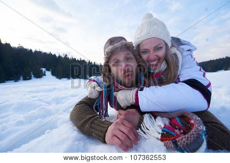 portrait of happy young romantic tourist  couple outdoor in nature at winter vacation