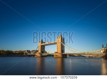 Tower Bridge in the sunset with clear blue sky, London, UK