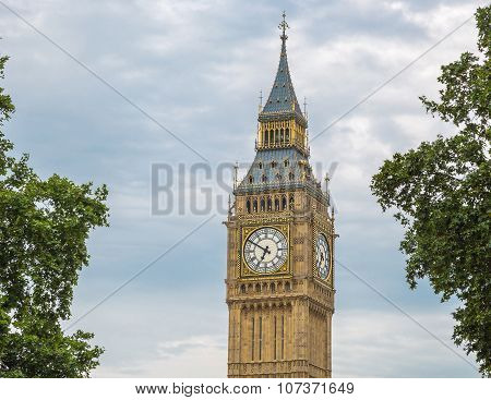 Detail shot of the Big Ben with trees, London, UK