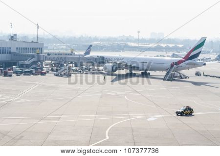 Passenger Airplane At The Gate.