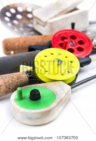 Closeup Ice-fishing Rods And Equipment