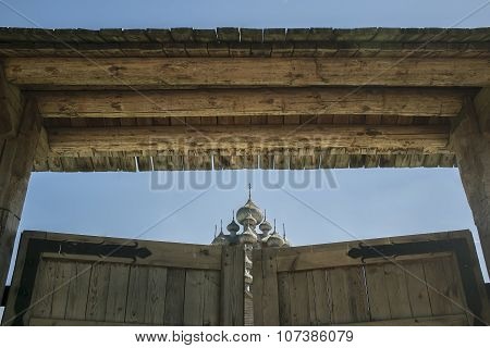 Closed Gate Through Which You Can See The Russian Orthodox Church