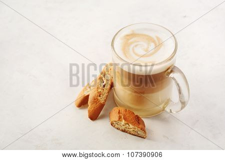 Cappuccino With Biscotti Or Cantucci On A White Table