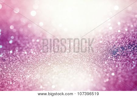Pink Festive Christmas abstract bokeh background, shining lights, holiday sparkling atmosphere, cele