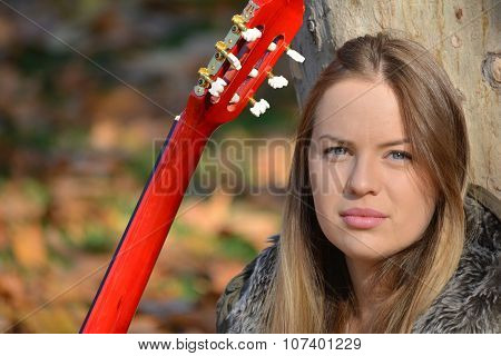 Blue Eyed Girl With Guitar
