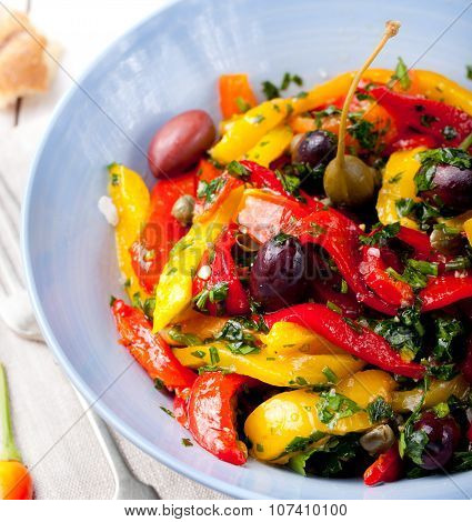Roasted yellow and red bell pepper salad. Grilled vegetables.