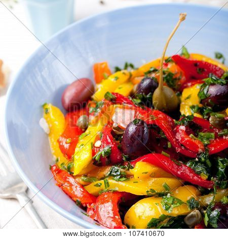 Roasted yellow and red bell pepper salad. Grilled vegetables.