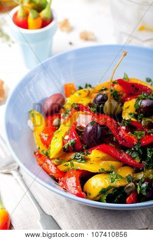 Roasted yellow and red bell pepper salad. Grilled vegetables.